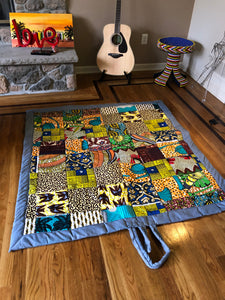 Loujoliwax™ Patchwork rug in wax fabrics